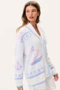 Light knit cardigan with V-neck, long sleeves, button front, blue trim and nautical print