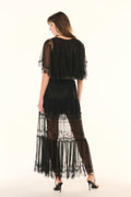Black lace pleated maxi skirt with sheer tiers, back view with gold chain detail