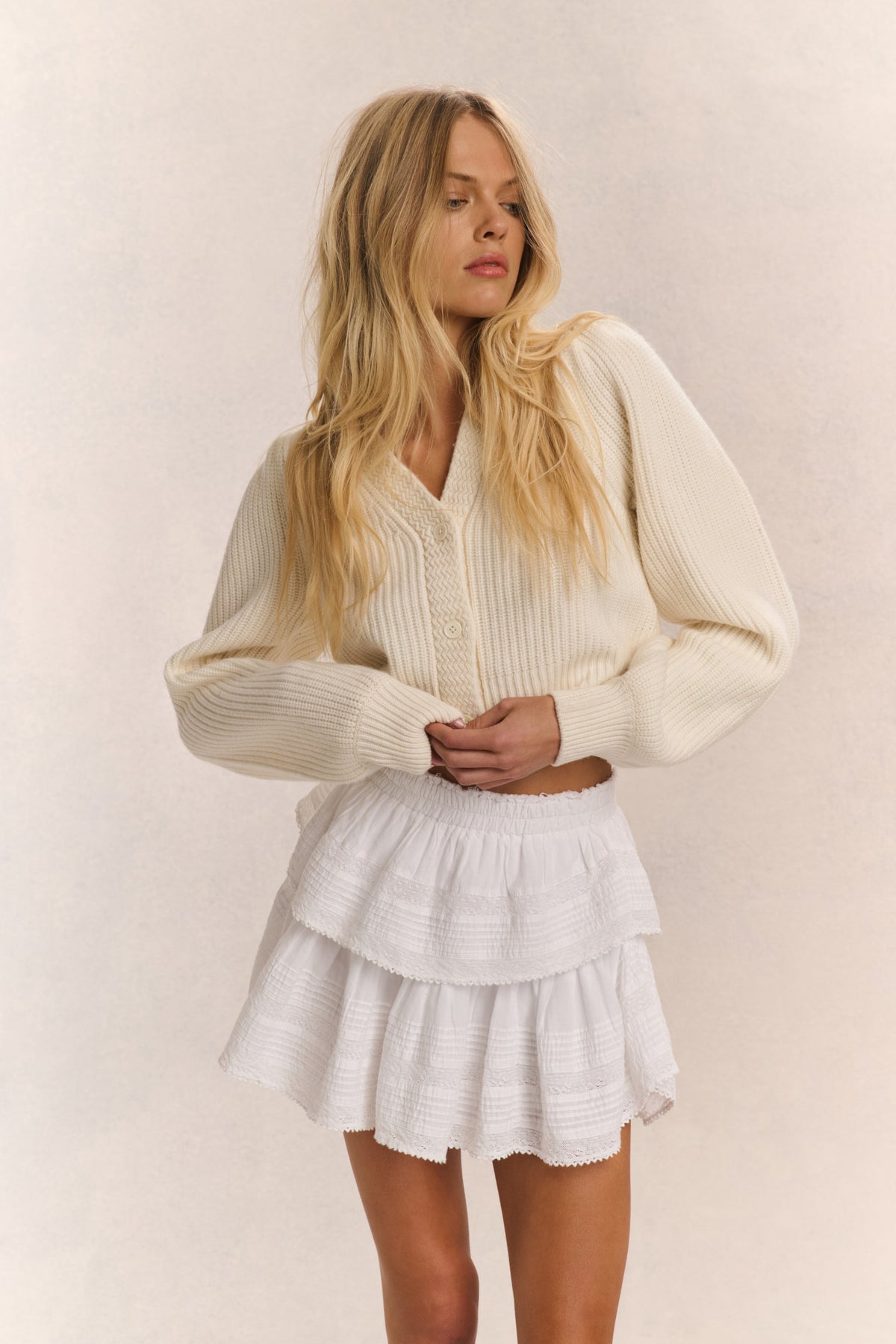 Ivory ribbed V-neck crop cardigan with button front and long sleeves