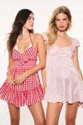 Pink polka-dot mini dress, sweetheart neckline, ruffled skirt, bow waist