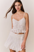 White cotton Victorian top with corset front buttons and lace-trim peplum hem