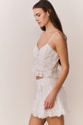 White cotton Victorian top with lace ruffles, front button placket, narrow straps