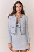 Light blue tweed jacket with denim trim, button front, flap pockets
