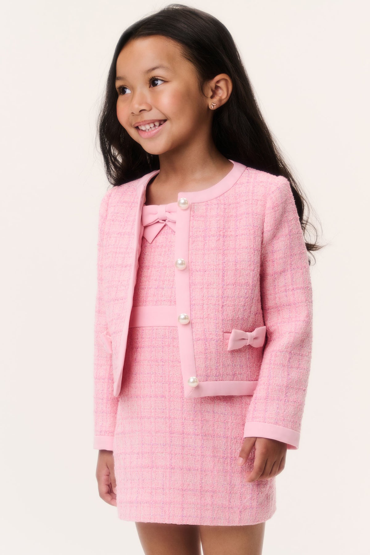 Girls pink tweed jacket with pearl button front and bow pocket detail