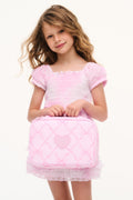 Pink zip lunch box with heart patch and crisscross pattern