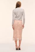 Back view of rose-gold beaded midi skirt with lace scallop hem