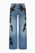 Bambie lace appliqué jeans in blue denim with black lace accents