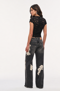 Lace appliqué jeans in dark wash denim, back view with wide legs