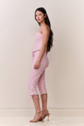 Pink gingham capri pants, side view with lace-tie cuffs and cropped length