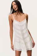 Ivory silk lace mini dress with spaghetti straps and scalloped lace hem