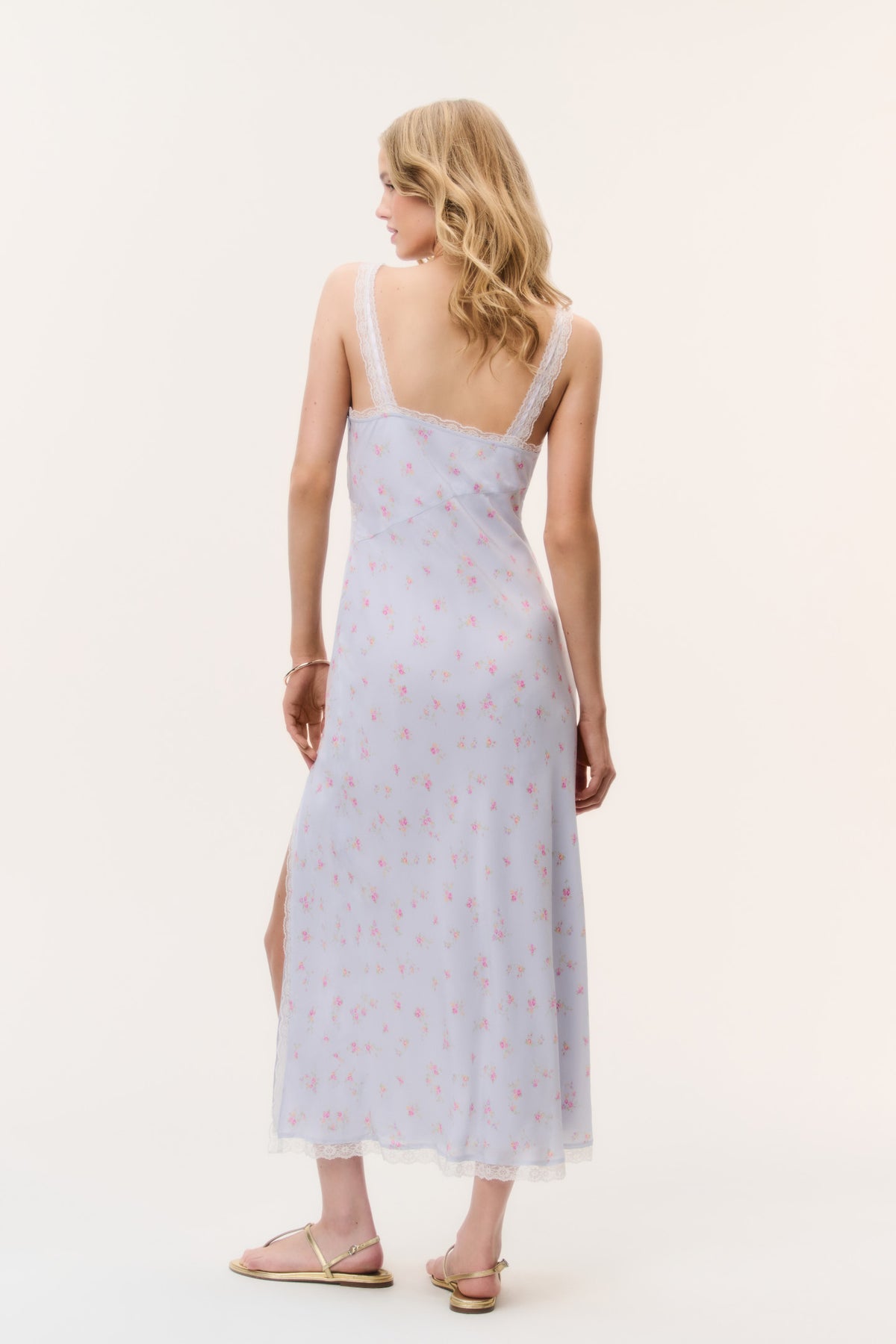 Light blue floral maxi dress back view with lace-trim straps and open-back look