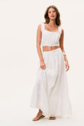 Optic white cotton maxi skirt with vertical pintuck texture and tiered hem
