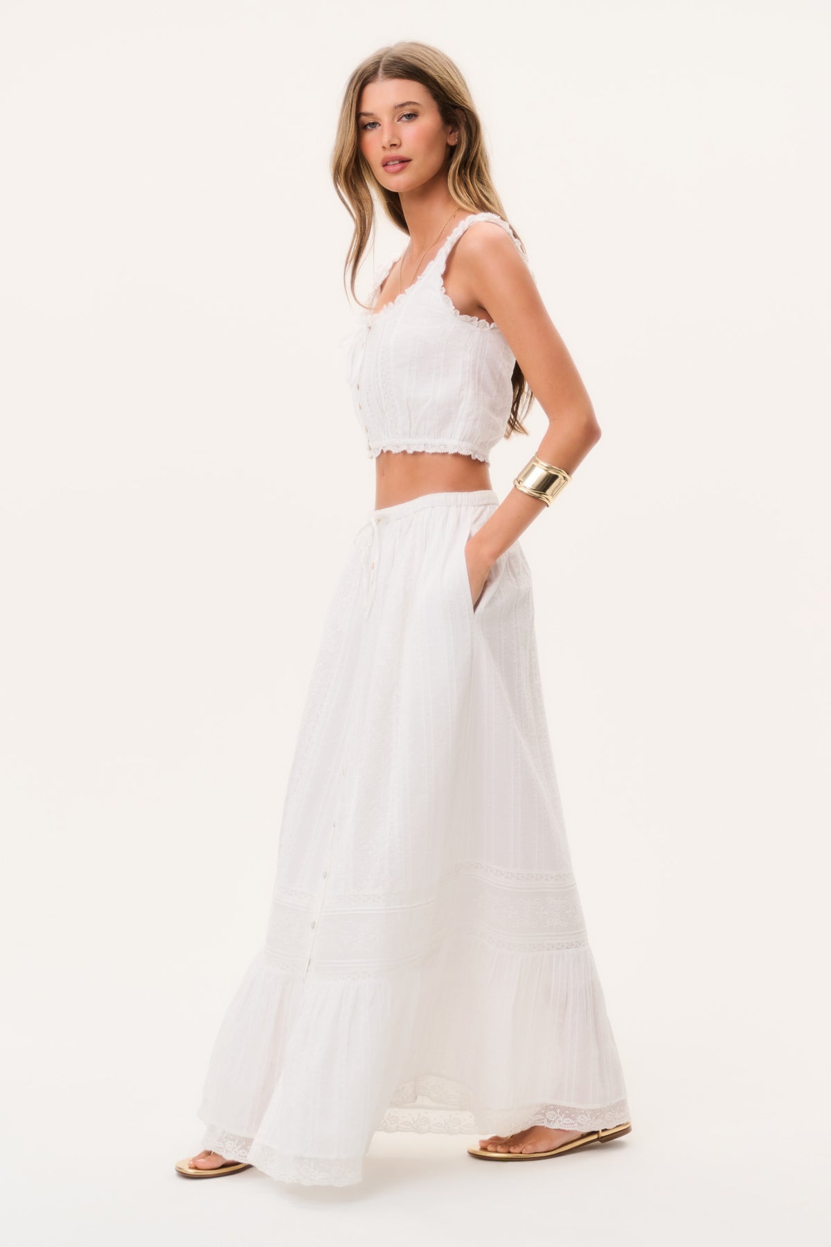 Optic white tiered maxi skirt with elastic waist and vertical pintuck texture