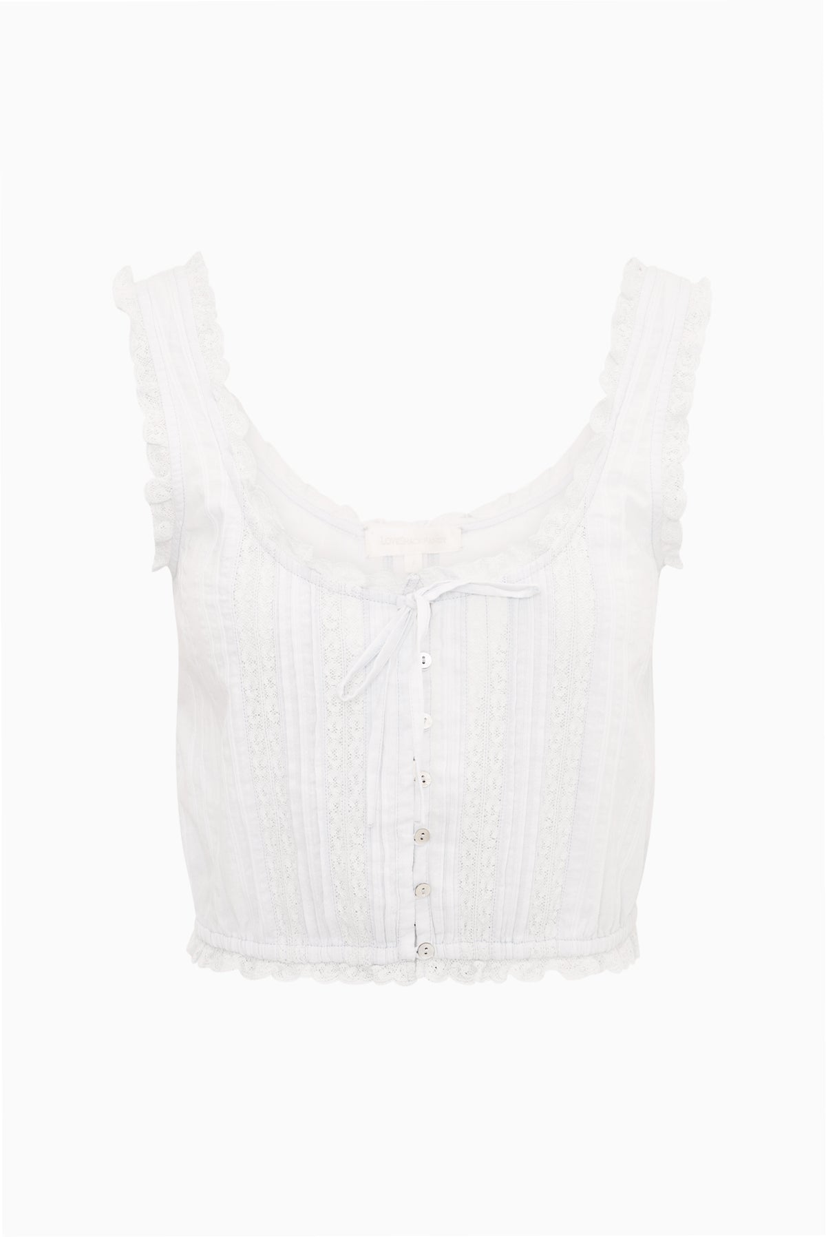 White cotton sleeveless top with U-neck ruffle trim and front button placket
