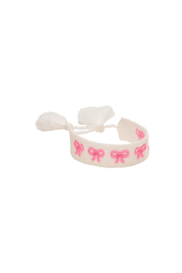 Bow woven fabric bracelet with pink bow embroidery and white bow tie accents