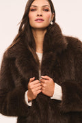 Dark brown faux fur jacket with open collar and front button placket