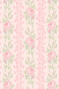 Peel-and-stick wallpaper with pink rose floral pattern and green leaves on a light base