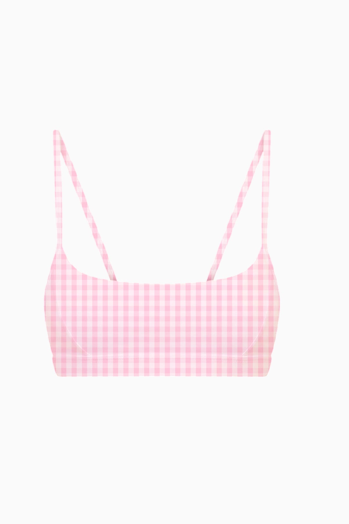 Pink sports bra with sweetheart neckline and thin straps, geometric grid print