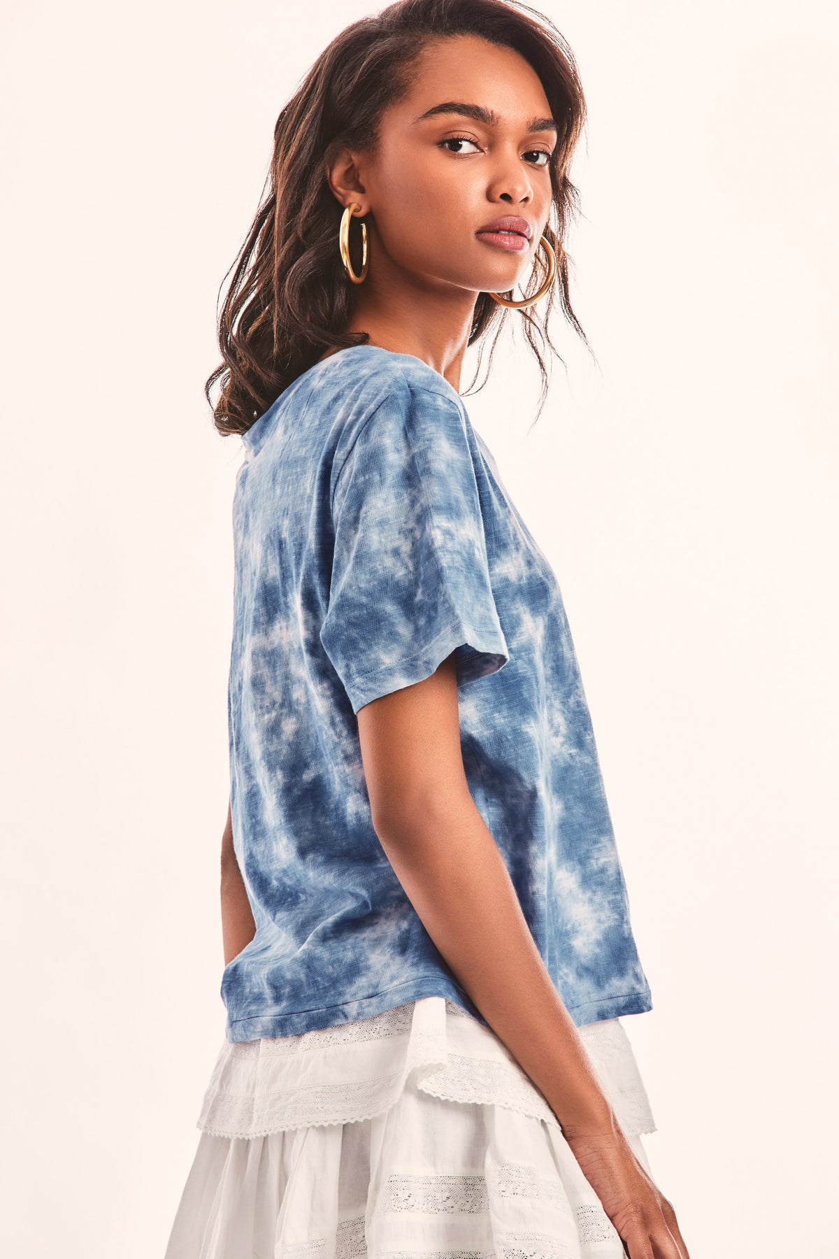 Blue tie-dye cotton tee, crew neck, short sleeves, side view