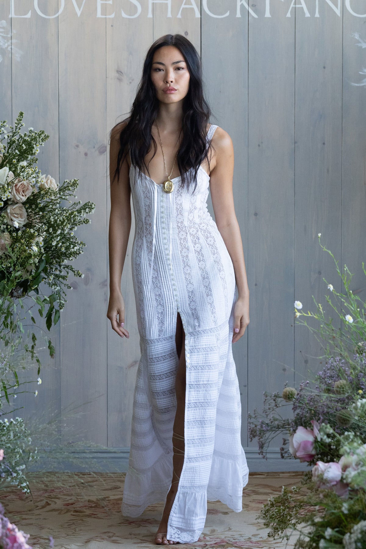 White cotton Victorian maxi dress with embroidered bodice and tiered skirt