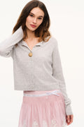 Light gray cashmere cardigan with button front and ribbed cuffs
