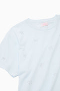 Light blue cotton tee with small embroidered-style heart and icon details