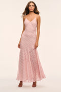 Light pink maxi dress with spaghetti straps, V-neck, and soft patterned fabric, front view.
