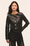 Black collarless leather jacket with gold snap buttons and lace detail at the waist