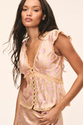 Silk-blend floral top in blush with gold lace trim, tassel tie-front, flutter sleeves