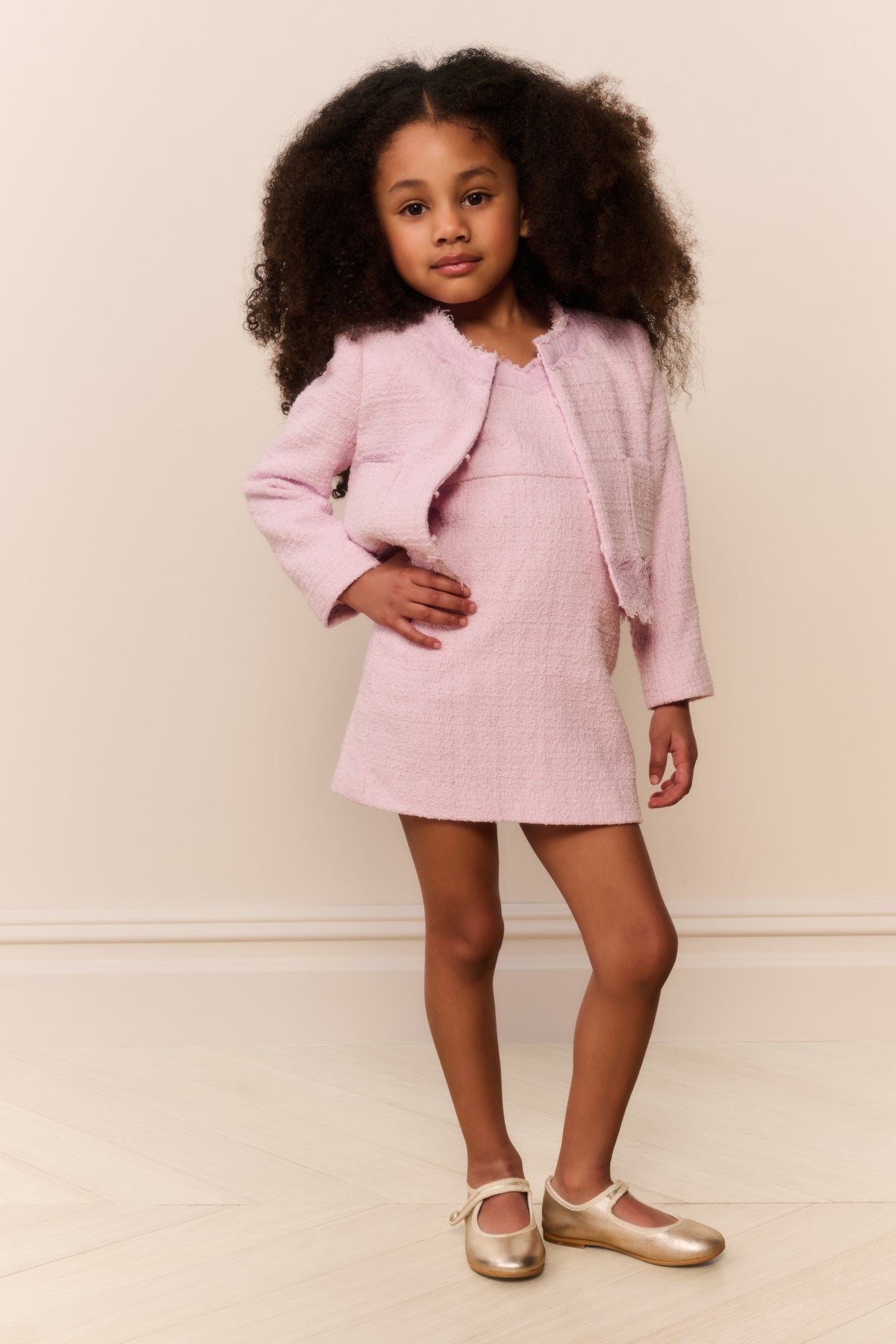 Girls pink tweed jacket with front lace panel and long sleeves