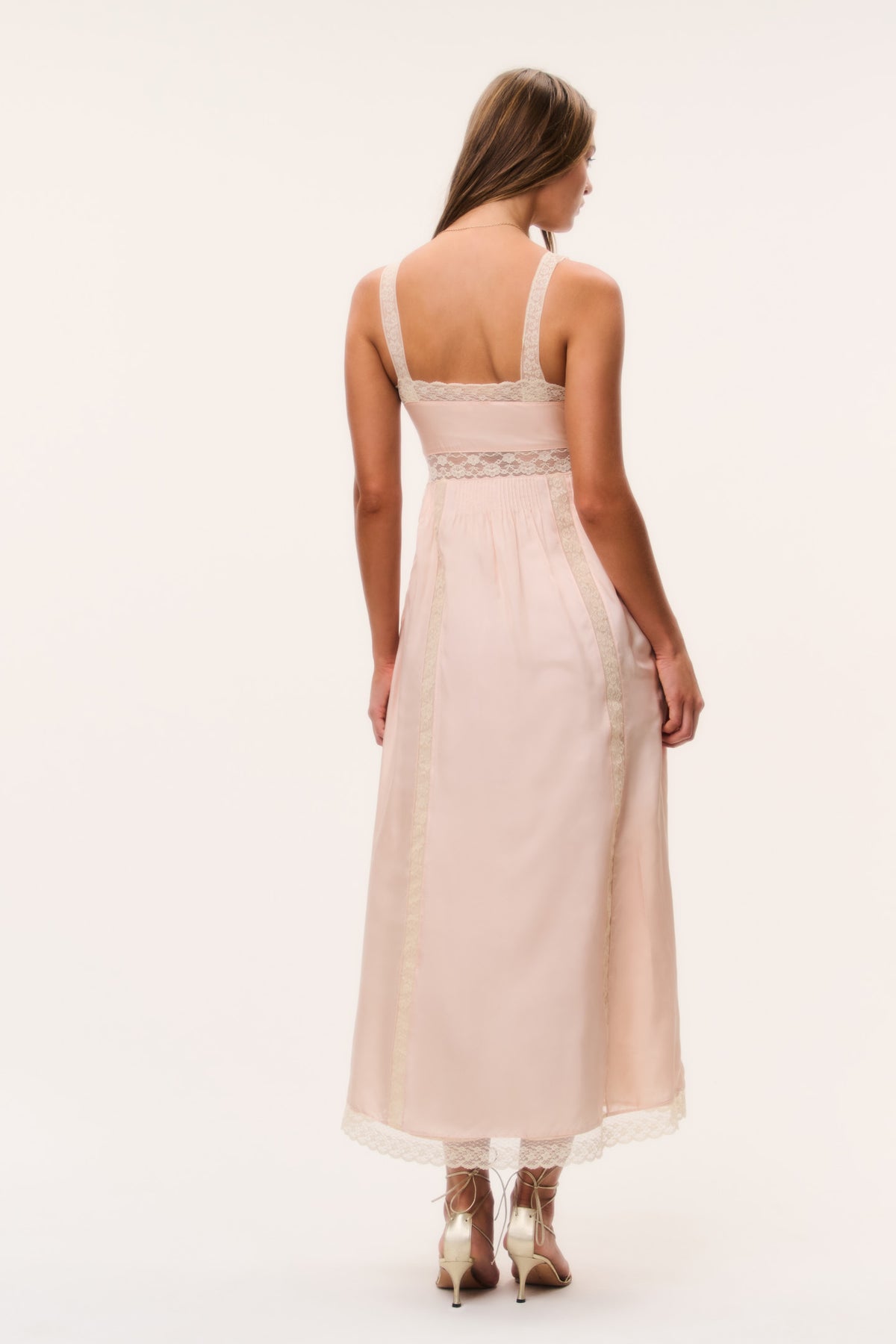 Back view of petal peach silk maxi dress with lace-trimmed straps