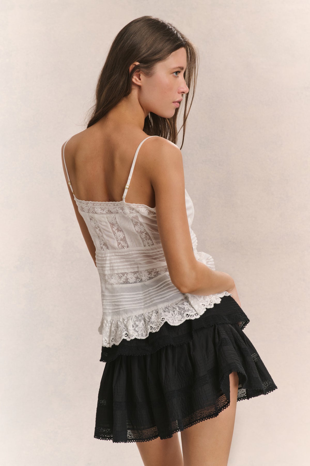 Cotton cami top in bright white with lace back yoke and thin straps.