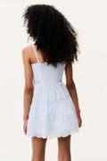 Blue tween mini dress back view with spaghetti straps and tiered ruffle skirt