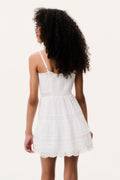 Optic white tween mini dress back view with spaghetti straps and tiered skirt