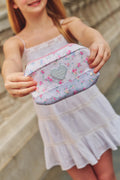 Floral pencil pouch with heart patch, zipper closure, wrist strap