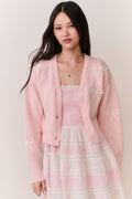 Petal pink cotton cardigan with bow embroidery and button-front placket