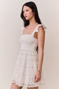 Side-view lace-trimmed cotton mini dress in pale white, square neck, ruffle straps
