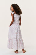 Girls back view of cherry stripe tiered skirt with elastic waist and ruffled tiers
