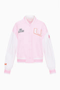 Pink collegiate varsity jacket with button front, striped rib trim, and U applique on chest