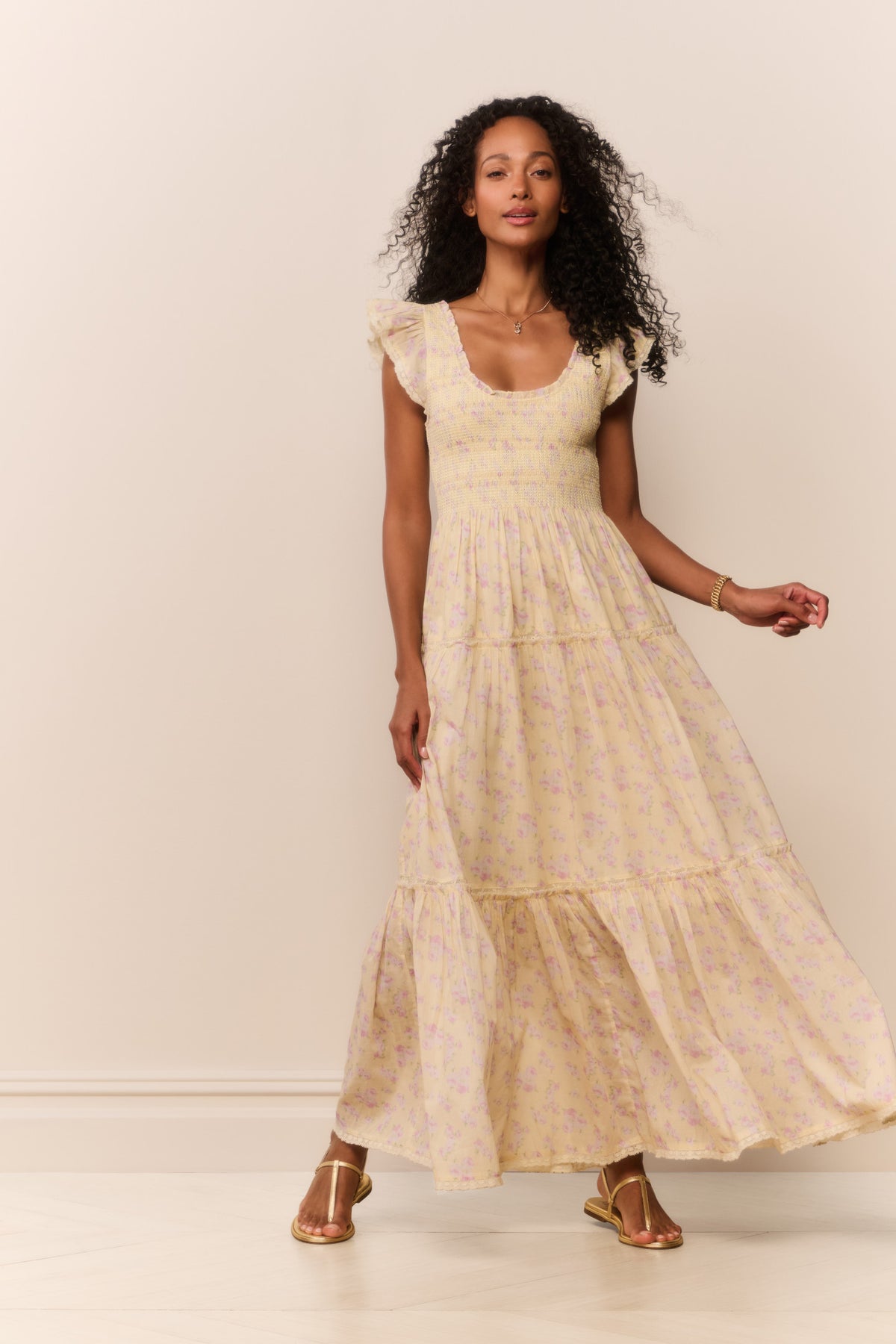 Lemon floral maxi dress with tiered hem and flutter cap sleeves, full length
