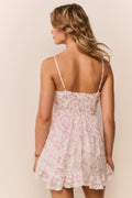 Floral mini dress back view with spaghetti straps and gathered waist tiers