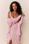 Floral chiffon maxi dress in light pink with ruffled shoulder straps and layered skirt