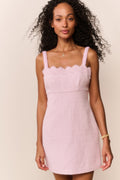 Blush lace-trim tweed mini dress with scalloped neckline and spaghetti straps.