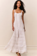 White cotton Victorian maxi dress full view with thin straps and tiered skirt detailing