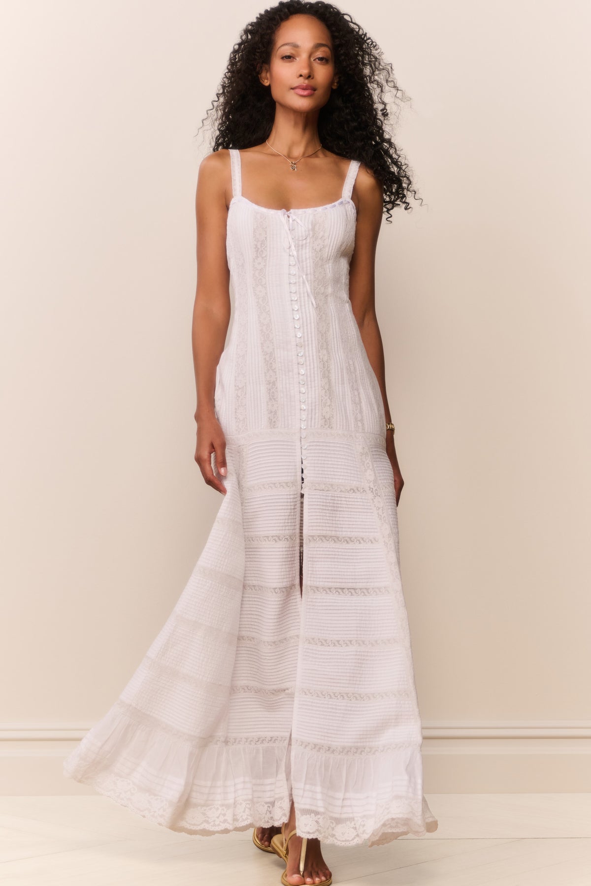 White cotton Victorian maxi dress full view with thin straps and tiered skirt detailing