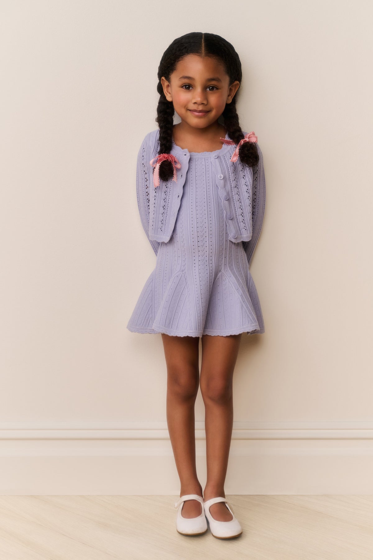 Girls lilac pointelle knit cardigan with button front and scalloped hem