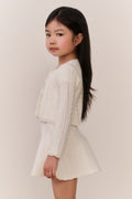 Girls cream pointelle knit cardigan with long sleeves and textured front panel