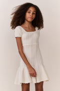 Tween pointelle stretch dress in white, angled view with short puff sleeves