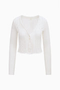 White crochet cardigan sweater with V-neck opening and long sleeves, cropped length