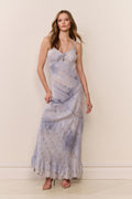 Light blue strappy maxi dress with patterned tiers and lace-trimmed hem